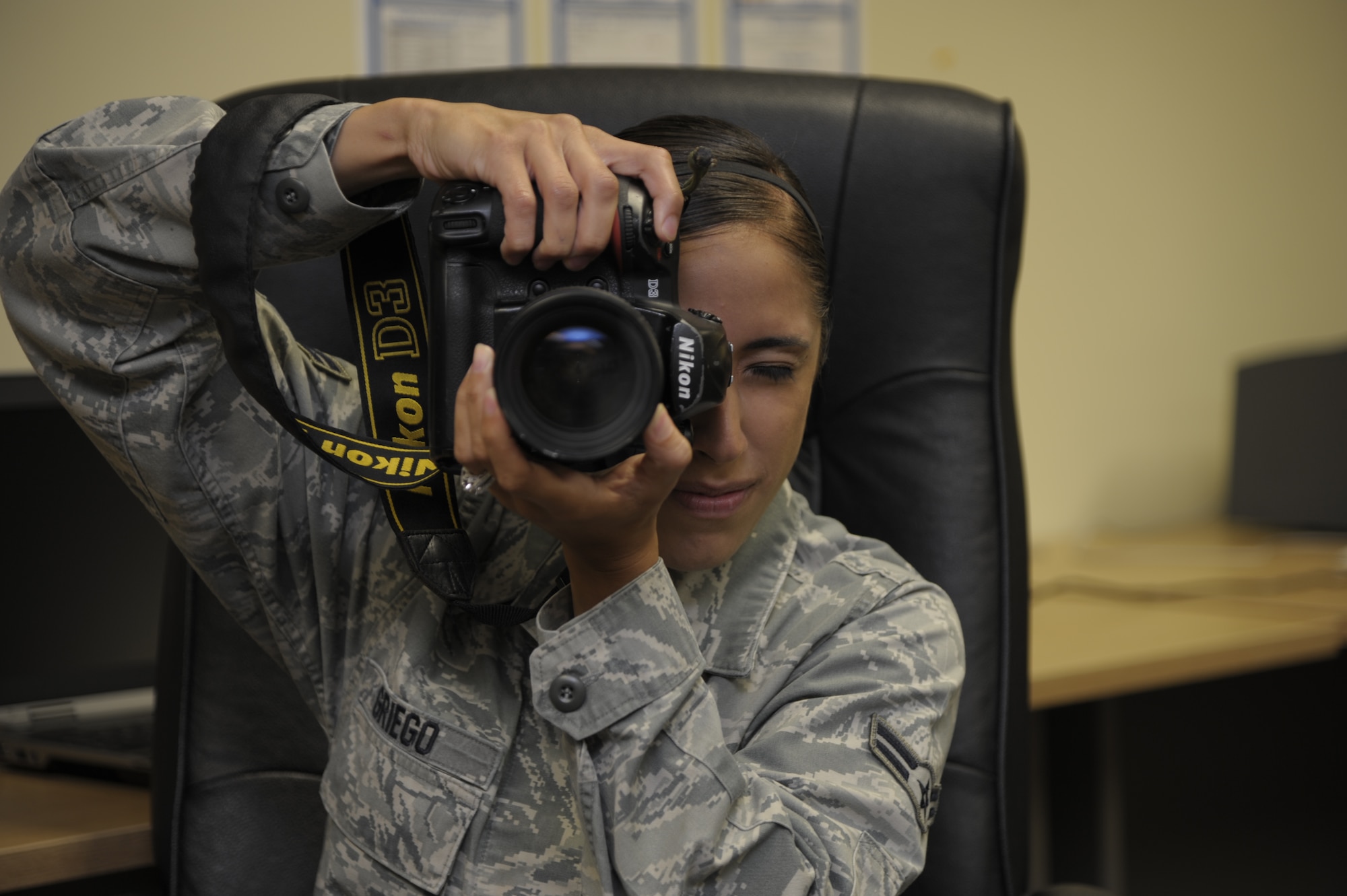 Airman 1st Class Naomi Griego, media relations specialist and photojournalist for 1st Special Operations Wing, is selected for this month's "Tip of the Spear" spotlight at Hurlburt Field, Fla., June 11, 2013. (U.S. Air Force photo by Airman 1st Class Stephen Ellis)
