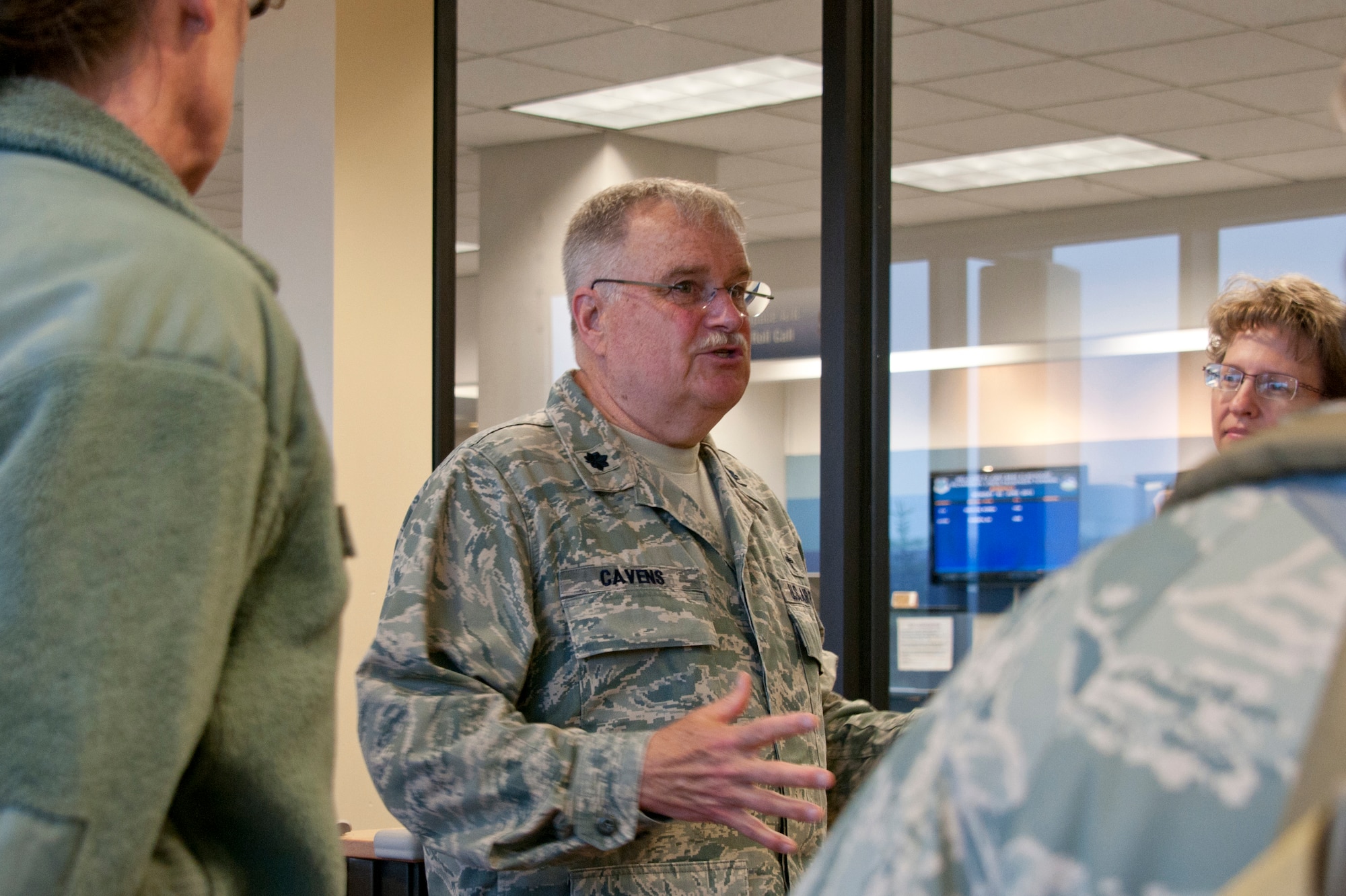 LANAI, Hawaii - Chaplain Rick Cavens, the head chaplain from the Alaska Air National Guard's 176 Wing, gives the Word of the Day before members depart for a medical mission. Forty-five Alaska military personnel from Air and Army National Guard and active-duty Air Force traveled to set up and run medical clinics for medically-underserved Hawaiians on the islands of Lanai and Maui as part of an Innovative Readiness Training project June 4 to 12. The group joined about 500 other military personnel from multiple components of the Air Force, Army and Navy on four Hawaiian Islands at six sites as a joint training mission called TROPIC CARE 2013 – the largest IRT mission since the program began. National Guard photo by Staff Sgt. N. Alicia Goldberger.