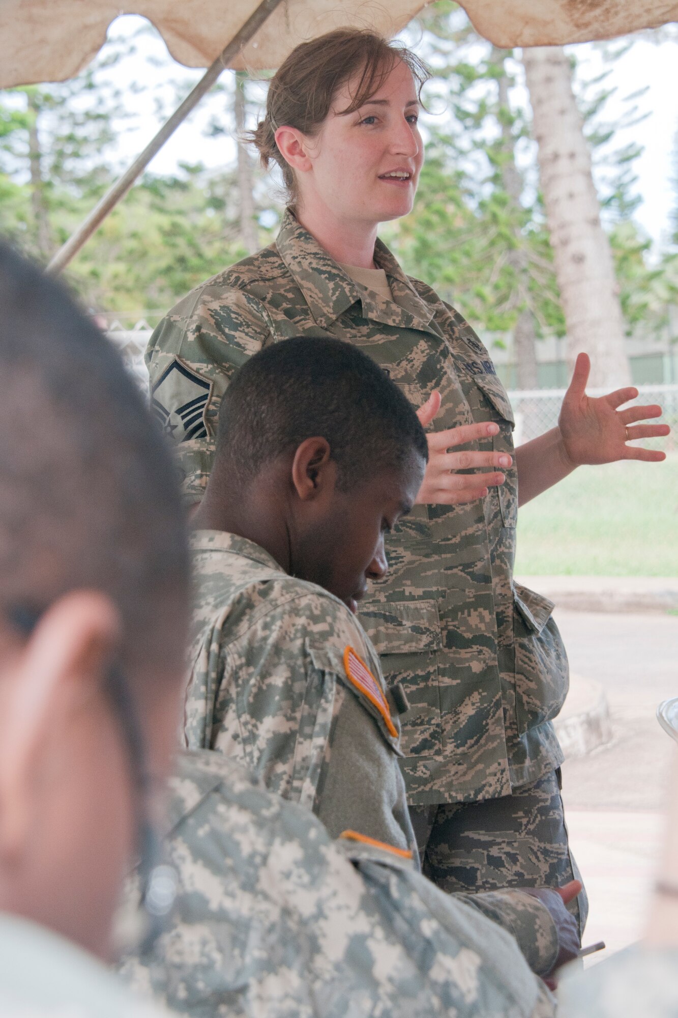 LANAI, Hawaii - Master Sgt. Jessica Alvarez trains airmen and soldiers June 5, 2013, on immunizations during a medical training mission in Hawaii. Forty-five Alaska military personnel from Air and Army National Guard and active-duty Air Force traveled to set up and run medical clinics for medically-underserved Hawaiians on the islands of Lanai and Maui as part of an Innovative Readiness Training project June 2 to 14. The group joined about 500 other military personnel from multiple components of the Air Force, Army and Navy on four Hawaiian Islands at six sites as a joint training mission called TROPIC CARE 2013 – the largest IRT mission since the program began. National Guard photo by Staff Sgt. N. Alicia Goldberger.