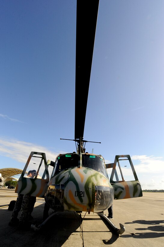 A UH-1H Huey, the last active helicopter from Hurlburt Field, sits on the flight line at Hurlburt Field, Fla., June 5, 2013. The Huey is scheduled for a three-day flight to Latham, N.Y., during which it will undergo frequent inspections before being added to the New York State Police's aviation unit. (U.S. Air Force photo by Airman 1st Class Jeffrey Parkinson)