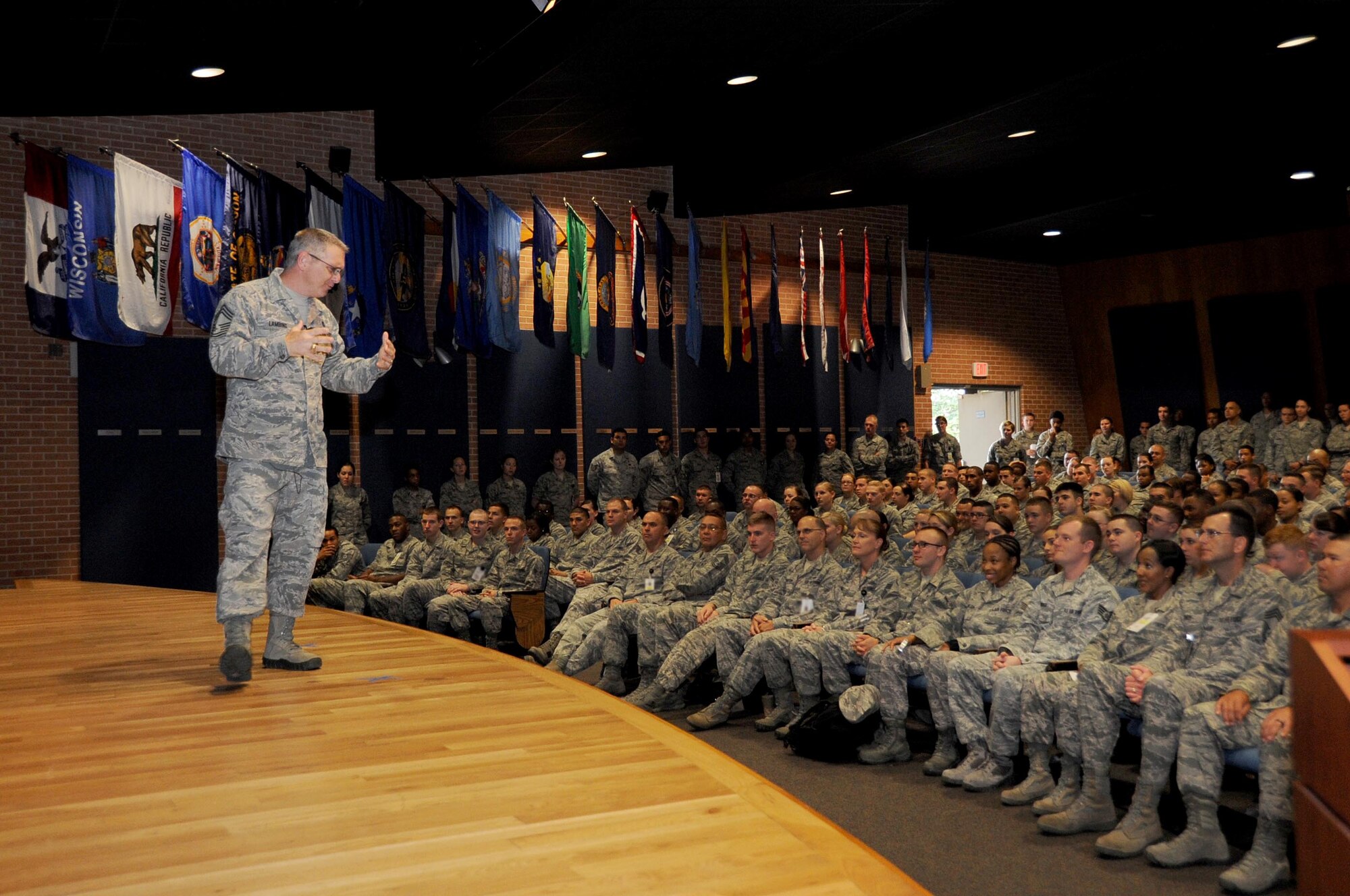 Chief Master Sgt. Kevin Lambing briefs Airmen June 6, 2013 at Wilford Hall Ambulatory Surgical Center, Joint Base San Antonio-Lackland, Texas. He addressed welfare, readiness, morale, and career progression within the Air Force Medical Service. Lambing is the Chief of Medical Enlisted Force and personal advisor to the Air Force Surgeon General. (U.S. Air Force photo/Staff Sgt. Josie Walck)
