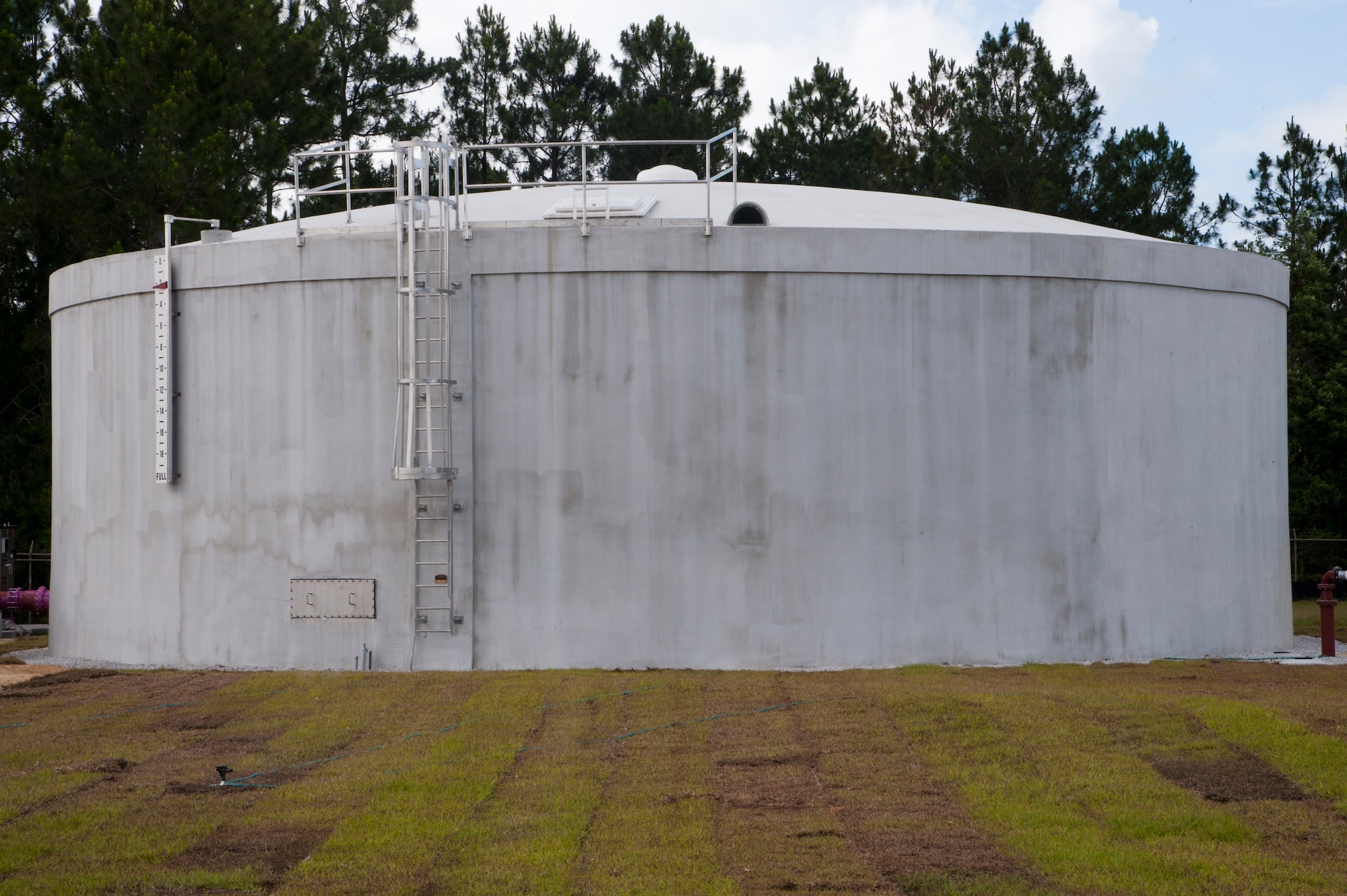 The Hurlburt Field Advanced Wastewater Treatment Plant’s reclaimed water storage tank holds 500,000 gallons of treated water for use at various locations on Hurlburt Field, Fla., June 4, 2013. The reclaimed water will be supplied to the CV-22 Osprey Helicopter wash rack, Air Park, community park/ball fields, Red Horse ball fields and other locations on base. (U.S. Air Force photo by Airman 1st Class Jeffrey Parkinson)