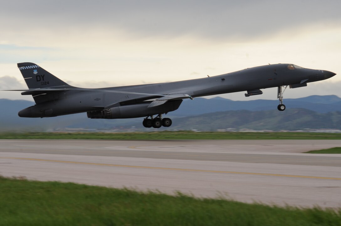 A B-1 bomber from Dyess Air Force Base, Texas, thunders skyward from Ellsworth AFB, S.D., May 31, 2013. Dyess aircrews came to Ellsworth to assist in B-1 software upgrade training. Although from separate bases, the base’s maintainers and aircrew members work together to ensure all B-1s remain mission capable. (U.S. Air Force photo by Senior Airman Kate Maurer/Released)
