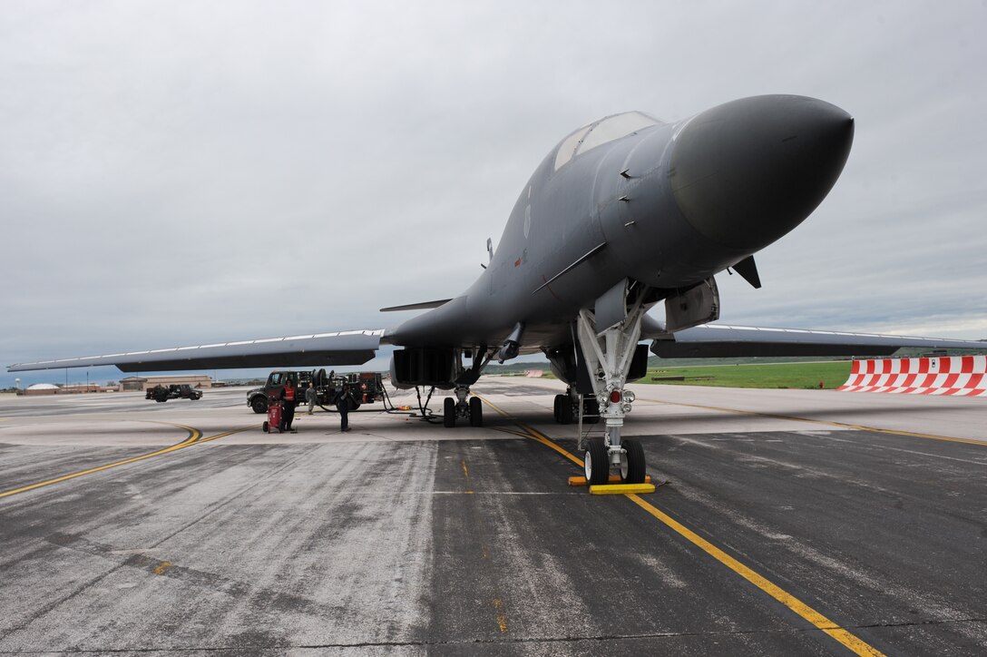 A B-1 bomber from Dyess Air Force Base, Texas, is hotpit refueled during software training on the flightline at Ellsworth AFB, S.D., May 31, 2013. Dyess aircrews visited Ellsworth to assist in B-1 software upgrade training. (U.S. Air Force photo by Senior Airman Kate Maurer/Released)

