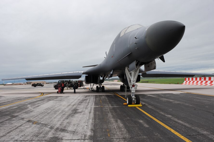 A B-1 bomber from Dyess Air Force Base, Texas, is hotpit refueled during software training on the flightline at Ellsworth AFB, S.D., May 31, 2013. Dyess aircrews visited Ellsworth to assist in B-1 software upgrade training. (U.S. Air Force photo by Senior Airman Kate Maurer/Released)


