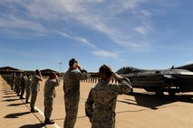 Airmen from the 388th Fighter Wing salute their commander, Col. Scott Long, as he taxis down the runway on his final F-16 flight at Hill Air Force Base, Utah, June 6, 2013. Long is a command pilot with more than 2,900 flying hours, including more than 130 combat missions in support of Operations Desert Storm, Southern Watch and Enduring Freedom. (U.S. Air Force photo/Airman 1st Class Scott Jackson/Released)

