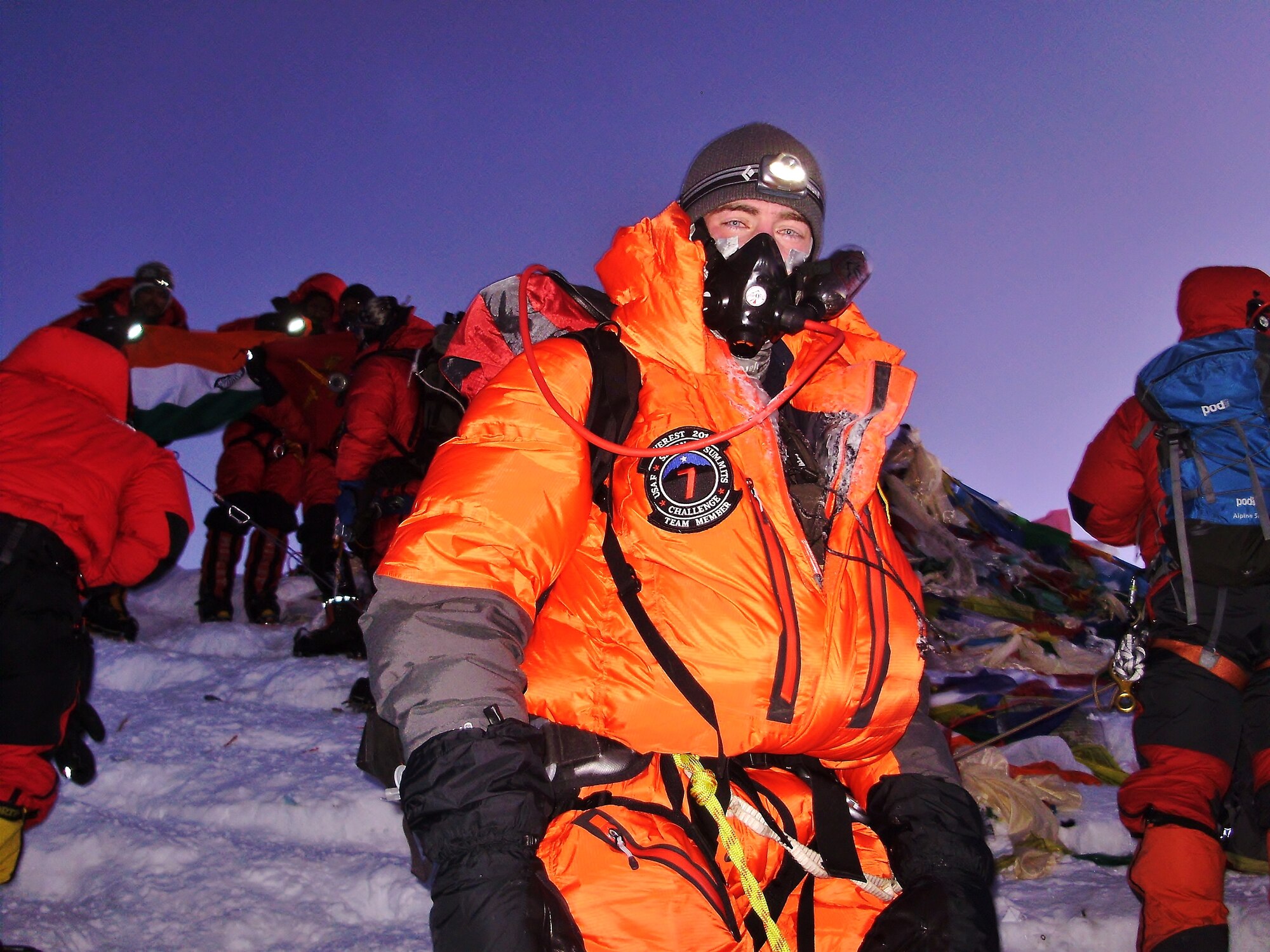 Capt. Marshall Klitzke, an instructor pilot with the 557th Flying Training Squadron at the U.S. Air Force Academy, Colo., poses for a photo at the summit of Mt. Everest, May 20, 2013.  Klitzke climbed Mt. Everest with the U.S. Air Force Seven Summits Challenge team, an independent group of Airmen who, through the sport of mountain climbing, aim to spread goodwill about the Air Force.  According to Klitzke, who has also climbed Mt. Rainier in Washington and Ama Dablam in Nepal, the group is the first military team to scale all seven and the first U.S. military team to summit Mt. Everest.  (Courtesy Photo)