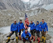Members of the U.S. Air Force Seven Summits Challenge team pose for a photo on Mt. Everest.  The team climbed Mt. Everest, reaching the summit on May 20, 2013.  The team is an independent group of Airmen who, through the sport of mountain climbing, aim to spread goodwill about the Air Force.  The team is aptly named for its self-imposed challenge to climb the highest peak on each of the world’s continents.  Since 2005, the team has scaled Mt. Elbrus in Europe, Mt. Kilimanjaro in Africa, Mt. Aconcagua in South America, Mt. McKinley in North America, Mt. Vinson in Antarctica, Mt. Kosciuszko in Australia, and finally, signifying the completion of their goal, Mt. Everest in Asia.  (Courtesy Photo)