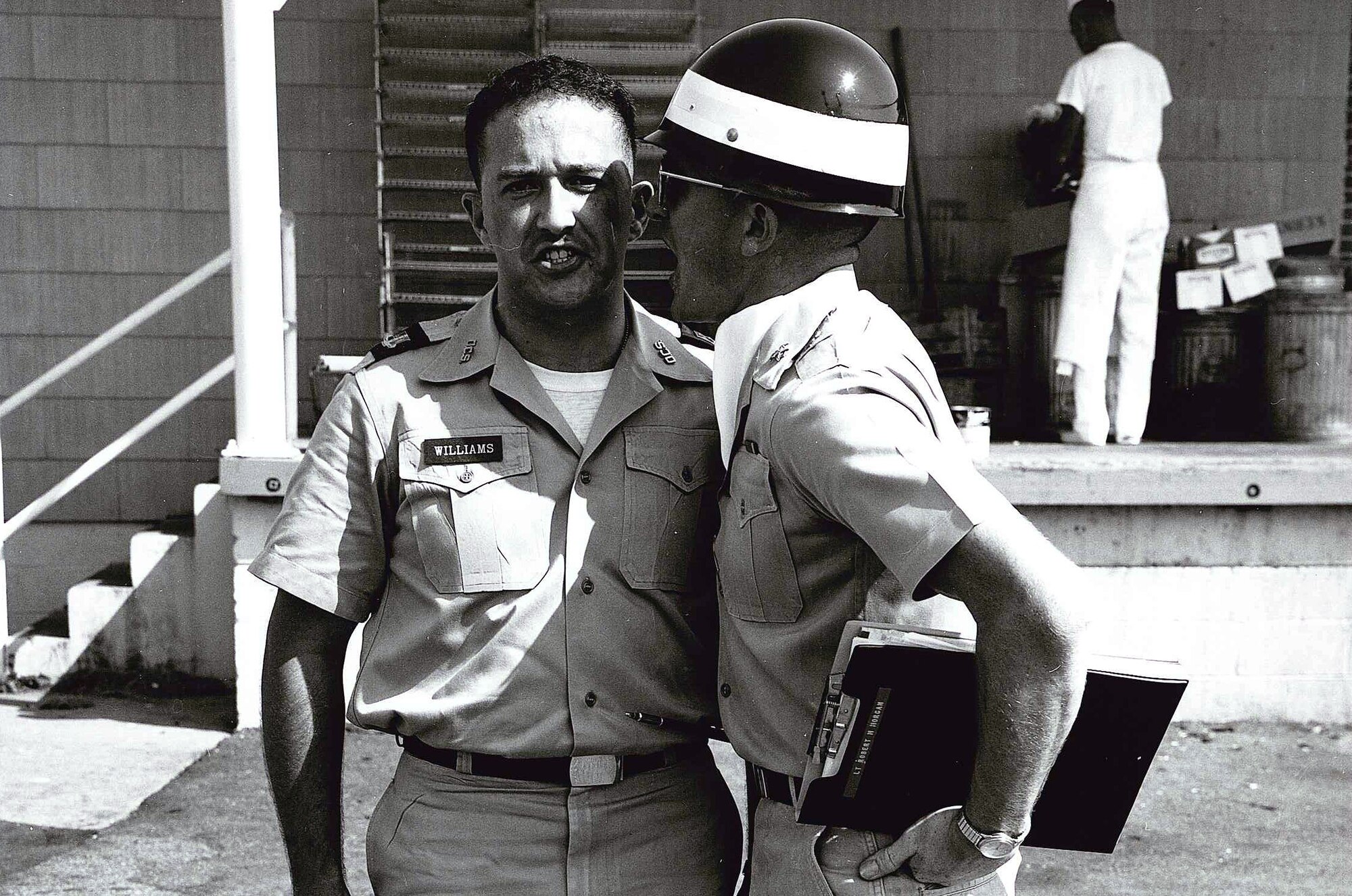 MCGHEE TYSON AIR NATIONAL GUARD BASE, Tenn. – A U.S. Air National Guard officer candidate receives instruction behind the old dining facility here during his training at the Academy of Military Science. After 38 years and more than 14,600 officers commissioned, AMS moved the six-week course to Maxwell Air Force Base, Ala., in 2009 to form a partnership with the Air Force's Officer Training School.  The move provided a shared, common experience for all officer candidates in the Total Air Force. (U.S. Air National Guard file-photo/Released)