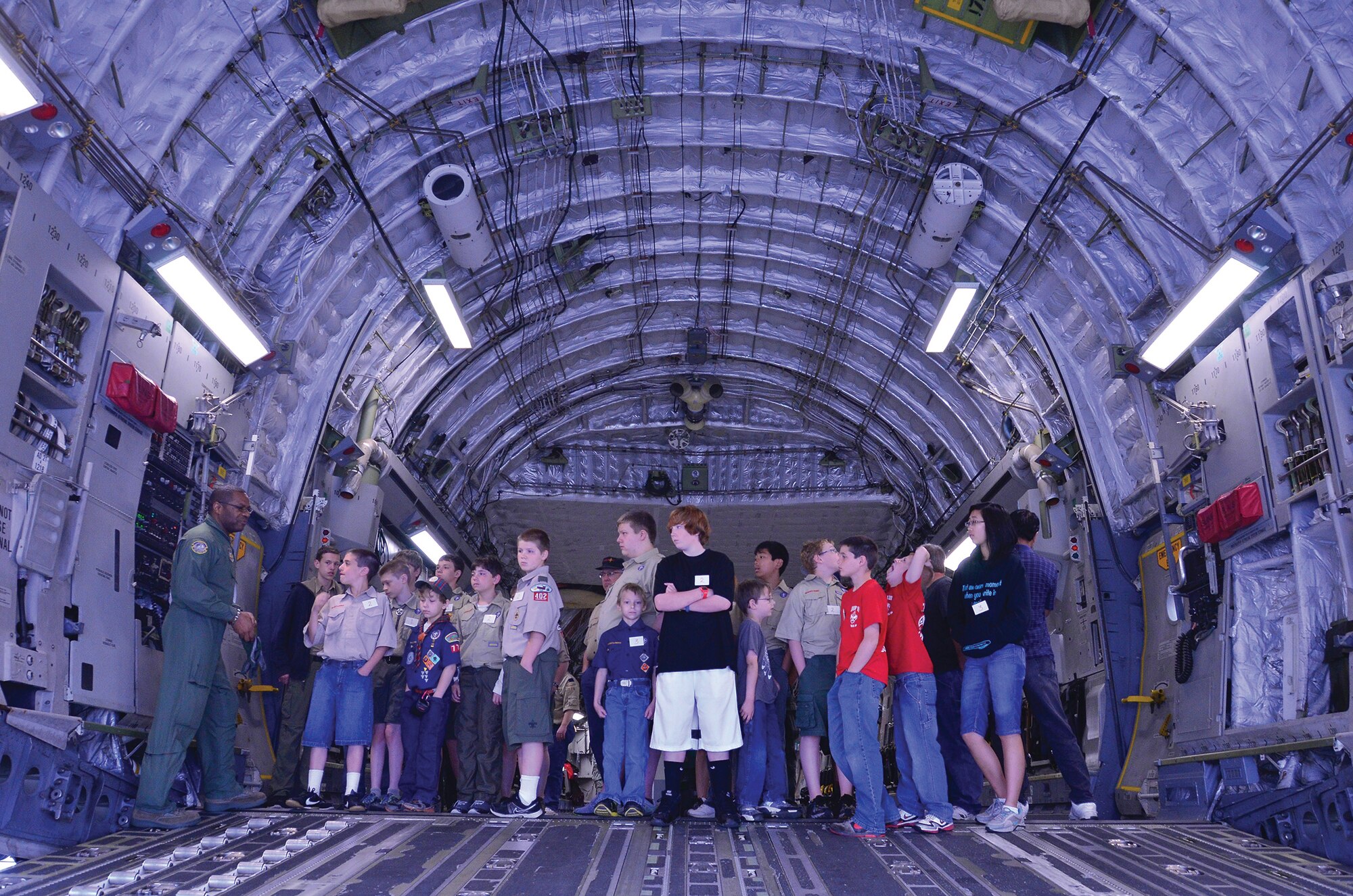 WRIGHT-PATTERSON AIR FORCE BASE, Ohio - Master Sgt. Lorenzo Law, 89th Airlift Squadron loadmaster, demonstrates opening the back door of a C-17 Globemaster III during the 445th Airlift Wing's annual Scouts Day May 18. (U.S. Air Force photo/Staff Sgt. Mikhail Berlin)