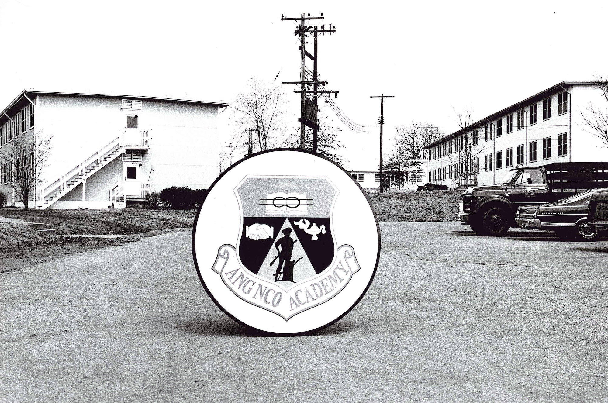 MCGHEE TYSON AIR NATIONAL GUARD BASE, Tenn. – A photo shows the early student dorms for Noncommissioned Officer Academy here. The buildings were torn down after the I.G. Brown Training and Education Center began a $9.5 million construction project in the late ‘80s for its current classroom building, a NCOA dormitory, a multi-purpose building and multi-media building, which were dedicated in October 1991.  Additional construction began that fall of three more dorms, an administrative building, a drill pad and running track, making what is today’s modern campus. (U.S. Air National Guard file-photo/Released)