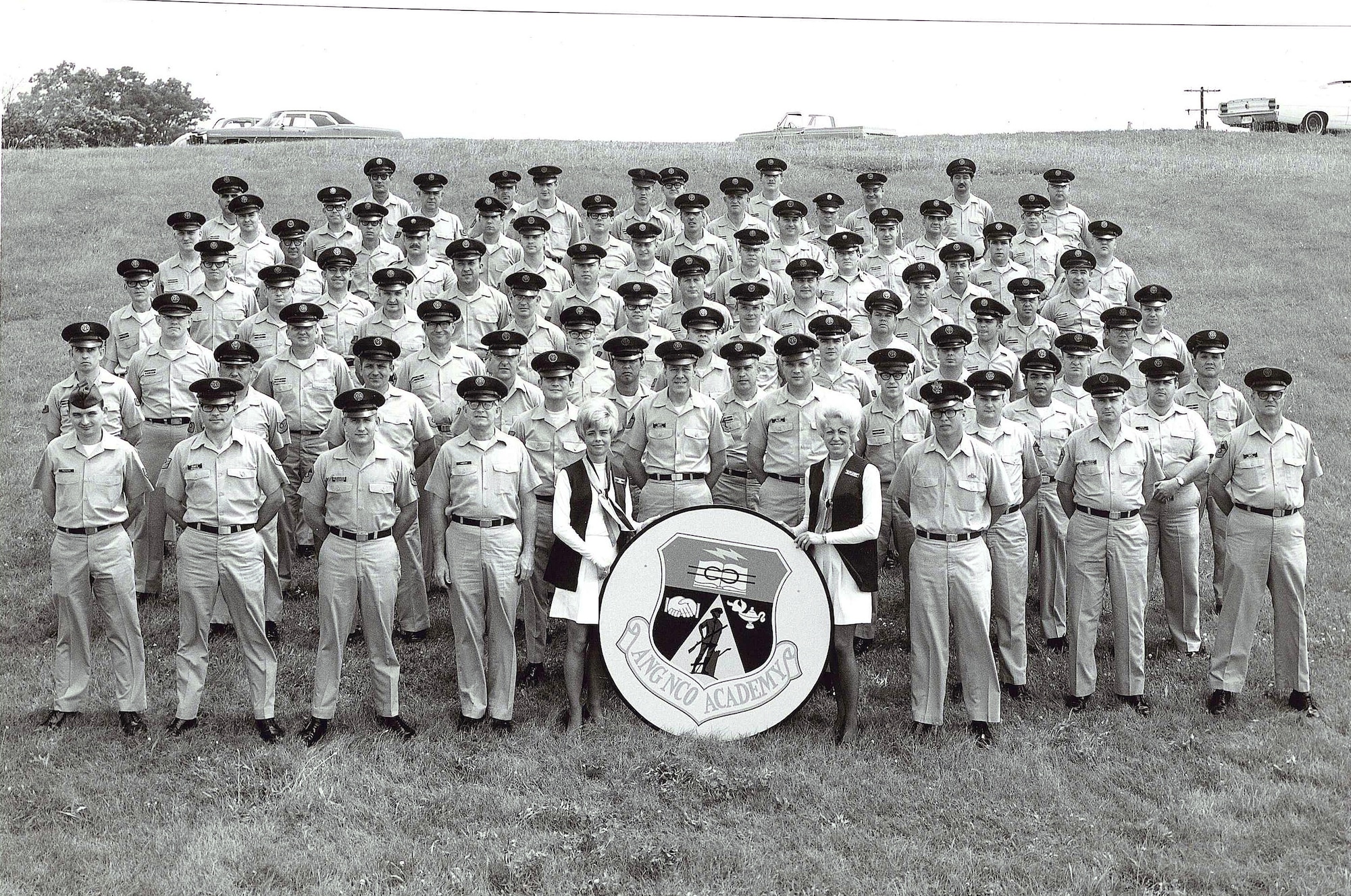 MCGHEE TYSON AIR NATIONAL GUARD BASE, Tenn. – Students, administrators and instructors are pictured in an early class photo here of the Air National Guard’s Noncommissioned Officer Academy at the I.G. Brown Training and Education Center. The Center’s first program of instruction began in 1968. Many early class and flight photos were taken on the hill at McGhee Tyson ANGB. (U.S. Air National Guard file-photo/Released)