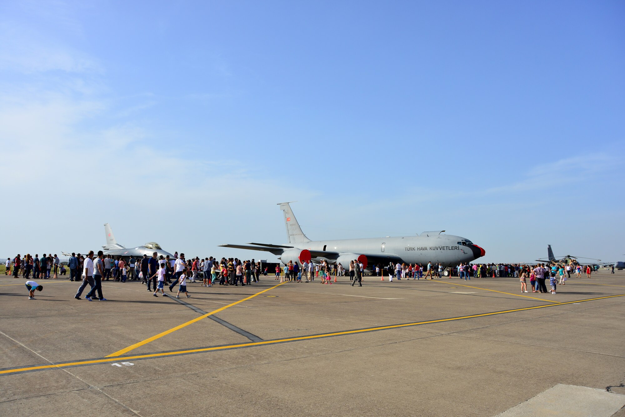 Incirlik members tour a Turkish KC-135 Stratotanker and F-16 Fighting Falcon during the Turkish air force’s 102nd anniversary celebration June 9, 2013, at Incirlik Air Base, Turkey. The TURAF invited all Incirlik members to the celebrations, which included static displays, a working dog demonstration and a musical performance from the Turkish Air Force Jazz Band. (U.S. Air Force photo by Staff Sgt. Eric Summers Jr./Released) 