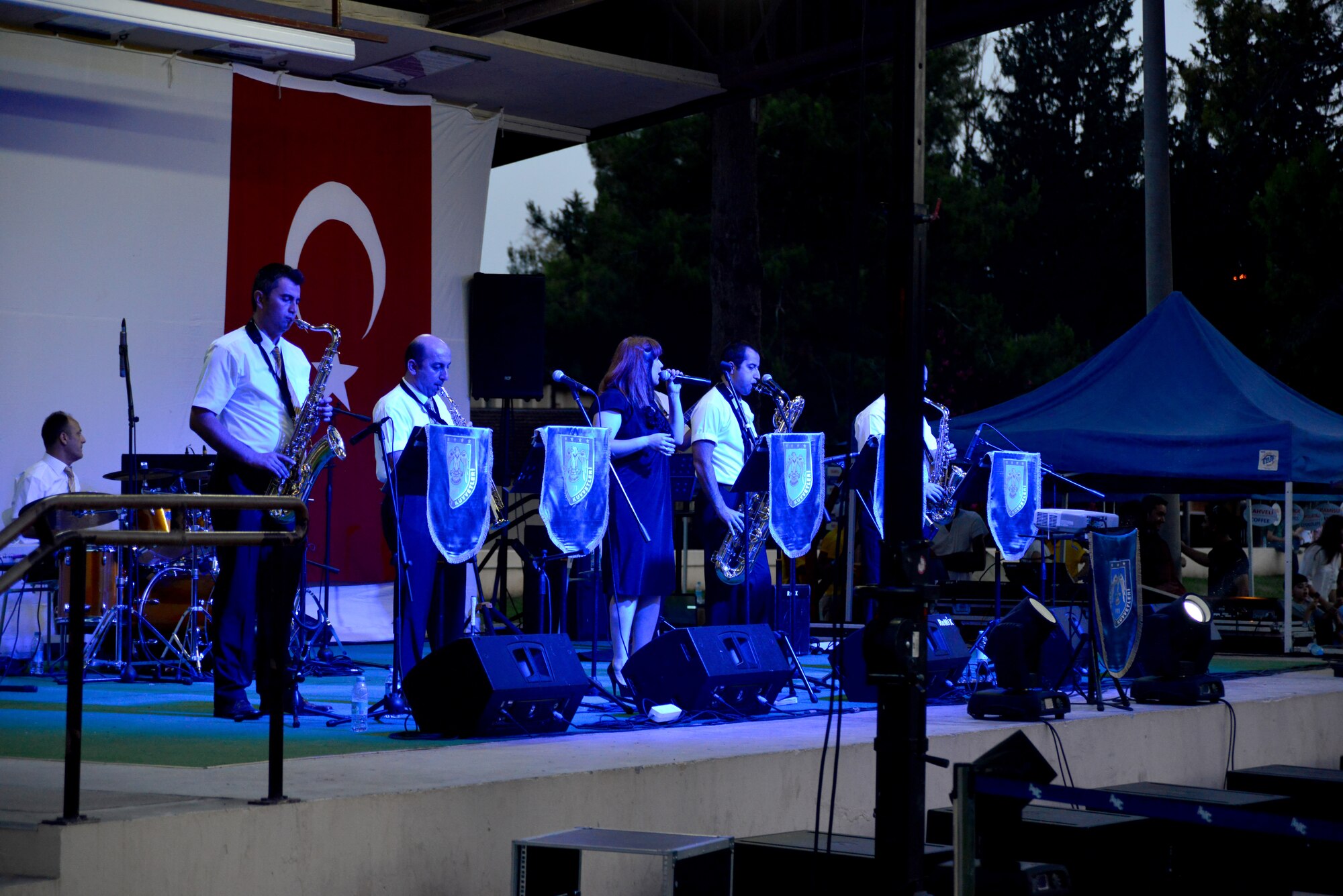 The Turkish Air Force Jazz Band plays for an American and Turkish audience in Arkadas Park June 9, 2013, at Incirlik Air Base, Turkey. The Turkish air force celebrated its 102nd anniversary by inviting members the Incirlik community to view static displays and enjoy a performance from the band. (U.S. Air Force photo by Staff Sgt. Eric Summers Jr./Released)