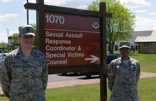 From left, Capt. Micah Smith and Tech. Sgt. Tiana Martel, Special Victims’ Counsel office staff, opened the doors to the Air Force’s first collocated SVC and SARC facility in Building 1070 June 3, 2013, at RAF Lakenheath, England. Smith, as the SVC for the United Kingdom, is part of a new Air Force pilot program to support victims and assist with understanding legal proceedings. (U.S. Air Force photo by Staff Sgt. Thomas Trower/Released) 