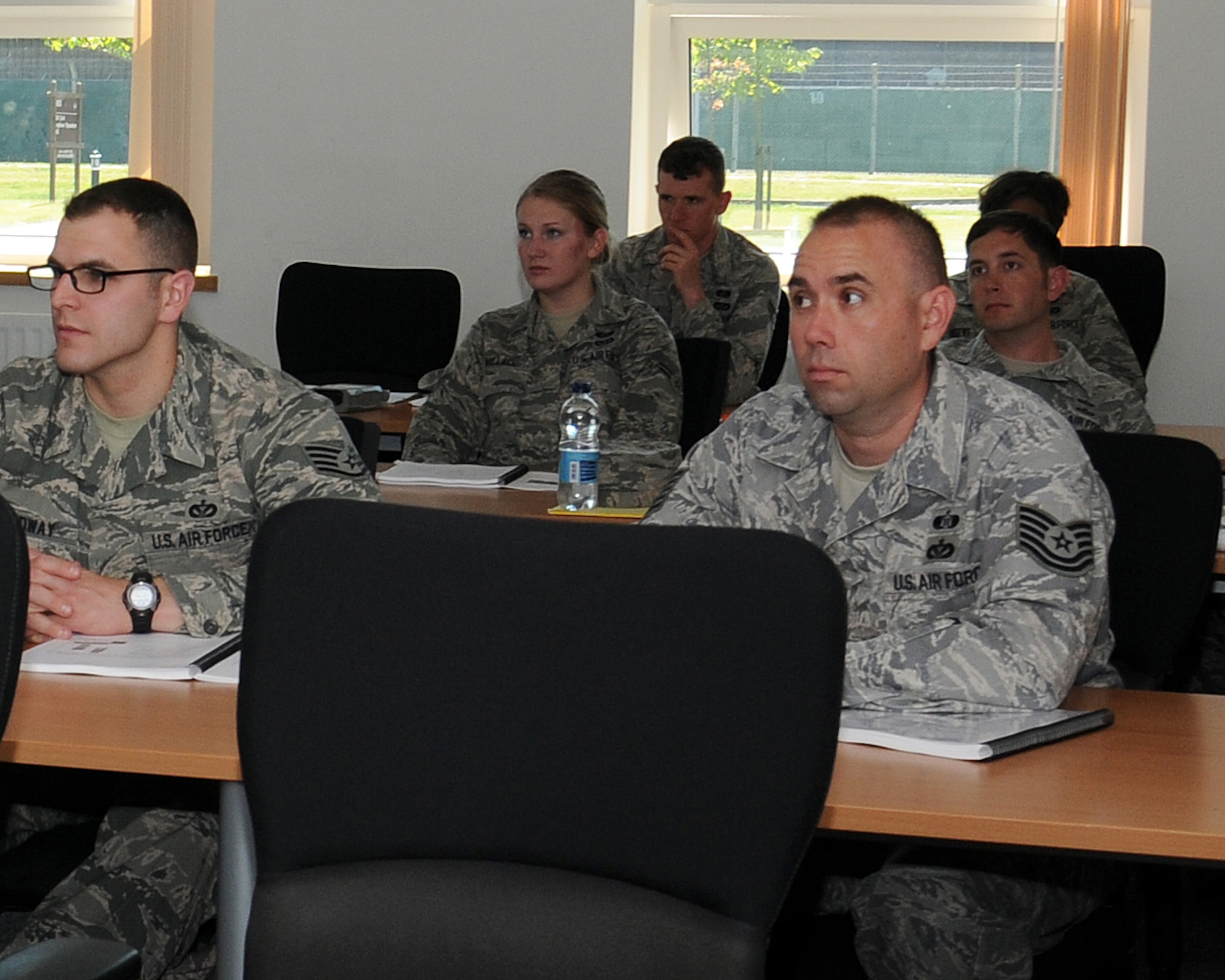 Service members from the 100th Civil Engineer Squadron Emergency Management team, the 100th CES Fire Department and the 48th Aerospace Medicine Squadron Bioenvironmental Engineering attend hazardous materials hands-on training June 6, 2013, at RAF Mildenhall, England. The two-day training ensured RAF Mildenhall first responders and emergency responders are better equipped to quickly and effectively mitigate a hazardous material incident. (U.S. Air Force photo by Gina Randall/Released)