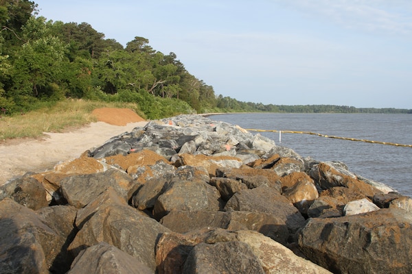 YORKTOWN, Va. – Contractors use rock to stabilize the York River shoreline along 800 feet of the Colonial National Parkway here June 6, 2013. The area is part of more than four miles of shoreline in need of stabilization due to severe erosion, which is threatening portions of the parkway and the National Park Service’s Colonial National Historic Park.    (U.S. Army photo/Patrick Bloodgood)  