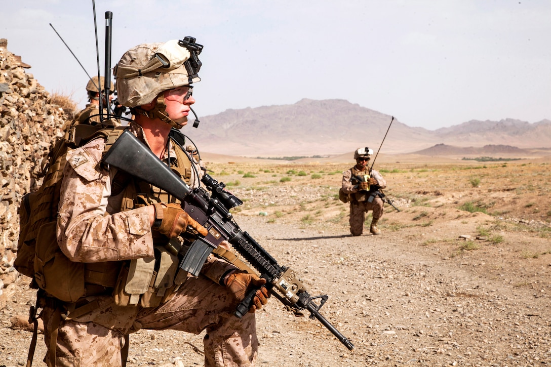 U.S. Marine Corps Lance Cpl. Dillion Hertweck provides security during Operation Nightmare in Nowzad in Afghanistan's Helmand province, June 6, 2013. Hertweck, a radio operator, is assigned to Fox Company, 2nd Battalion, 8th Marines, Regimental Combat Team 7.