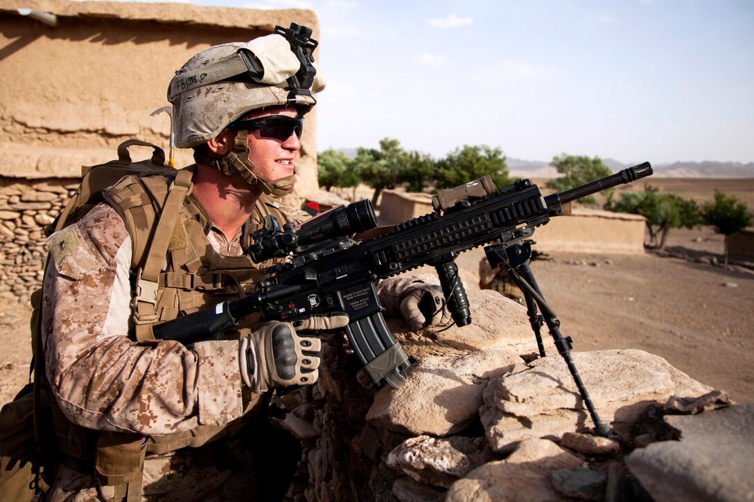 A U.S. Marine provides security during Operation Nightmare in Nowzad in Afghanistan's Helmand province, June 6, 2013.