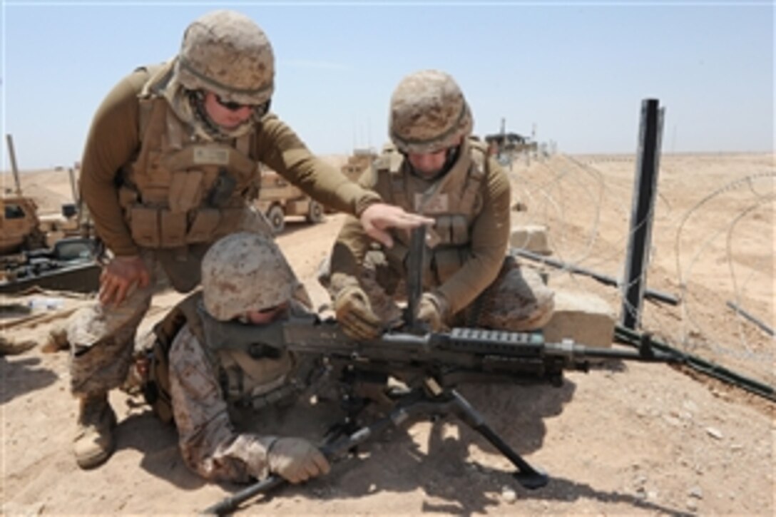 U.S. Navy Petty Officer 1st Class Baltazar Perez the M-240B fires a machine gun as he participates in marksmanship training on Camp Leatherneck, Afghanistan, June 1, 2013. Perez is assigned to Naval Mobile Construction Battalion 15, an expeditionary element of U.S. Naval Forces that supports units worldwide through force readiness, civil engineering, humanitarian assistance, and building and maintaining infrastructure.  