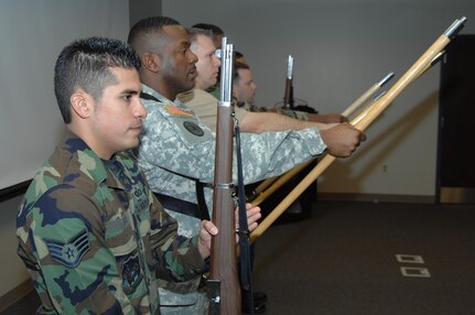 Staff Sgt. Sean Arce, a member of the NORAD and USNORTHCOM Joint Color Guard rehearses present arms recently. The Joint Color Guard has been chosen to represent the nation's armed forces during opening ceremonies for Super Bowl XLII Jan. 3, in Phoenix, Ariz. 