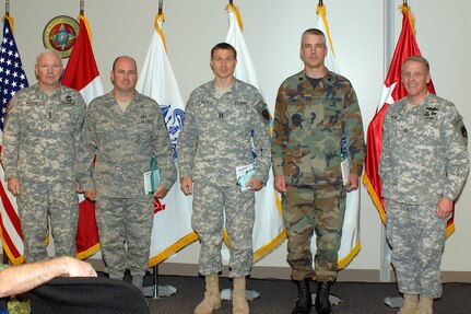 American and Canadian personnel monitor activity in the North American maritime and air domains in the new North American Aerospace Defense Command and U.S. Northern Command command center. NORAD and USNORTHCOM unveiled their new integrated command center in a May 13 ceremony at the commands’ headquarters at Peterson Air Force Base, Colo. 