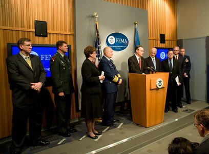 FEMA Administrator Paulison at the podium during a press conference at FEMA headquarters. FEMA is hosting their First Hurricane Awareness Day at FEMA headquarters to highlight the federal government's preparations for the 2008 Hurricane Season. On the dais; L-R, Mr. James. J. Madon, Director and Deputy Manager of the National Communications System in the Department of Homeland Security, Major General Guy C. Swan III, Chief of Operations for Headquarters, U.S. Northern Command, Ms. Mary S. Elcano, Acting President and CEO, American Red Cross, Admiral Thad W. Allen, Commandant, U.S.Coast Guard, FEMA Administrator David Paulison (at podium), DHS Secretary, Michael Chertoff, Mr. Paul McHale, Assistant Secretary of Defense for Homeland Defense, Dr. Gerald Parker, Principal Deputy Assistance Secretary for Preparedness and Response, U.S. Department of Health and Human Services, Major General William H. Etter, Acting Director of the Joint Staff, National Guard Bureau. FEMA/Bill Koplitz