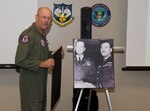 Commander of NORAD and USNORTHCOM, Gen. Gene Renuart, unveils a photo of Gen. Earl Partridge and Air Marshal Roy Sleman recently. Renuart recently approved re-naming of the Large Conference Room at NORAD and USNORTHCOM headquarters to the Partridge-Sliman Conference room in honor of the foresight and committment to international cooperation the two showed in the formative days of NORAD. Partridge was the first commander of NORAD and Sleman the first deputy.