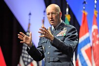 Gen. Gene Renuart, commander of North American Aerospace Defense Command and U.S. Northern Command, speaks at the sixth annual Homeland Defense Symposium in Colorado Springs, Colo., Oct. 29, 2008. Renuart discussed the homeland defense and homeland security missions of NORAD and USNORTHCOM and, specifically, how the commands fulfill those missions by collaborating with their civilian interagency partners.