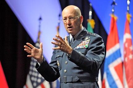 Gen. Gene Renuart, commander of North American Aerospace Defense Command and U.S. Northern Command, speaks at the sixth annual Homeland Defense Symposium in Colorado Springs, Colo., Oct. 29, 2008. Renuart discussed the homeland defense and homeland security missions of NORAD and USNORTHCOM and, specifically, how the commands fulfill those missions by collaborating with their civilian interagency partners.