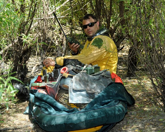A U-2 pilot inventories his survival gear during a combat search and rescue exercise at Beale Air Force Base, Calif., May 31, 2013. Many base agencies participated in the exercise, as well as the 129th Rescue Wing stationed at Moffett Federal Airfield, Calif.  (U.S. Air Force photo by Sean Bhakta/Released)