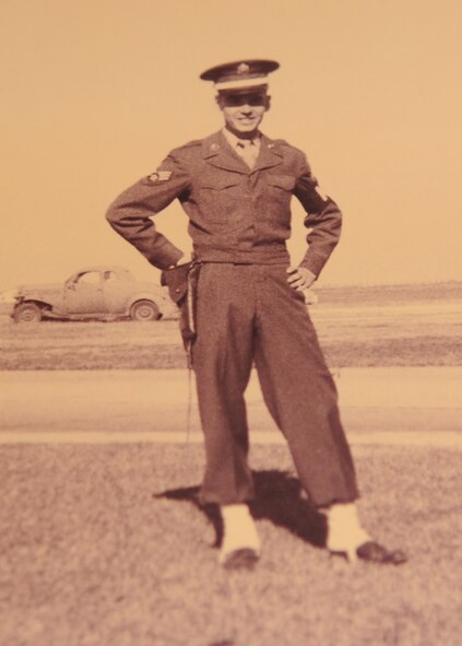 Dock Harris, a 32-year volunteer at the base pharmacy, is pictured in his Army Air Corps uniform in 1949. Harris served 13 years in the military before he was injured in Korea in 1951. (courtesy photo)