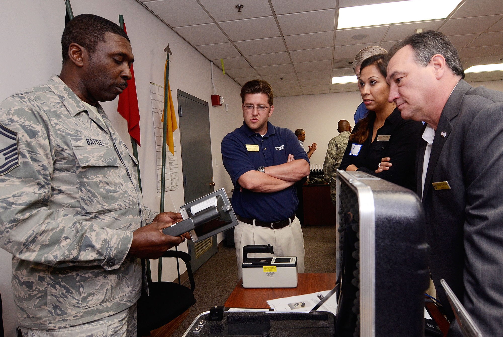 Senior Master Sgt. Kelvin Battle, 94th Emergency Management specialist, was on hand to demonstrate with some basic emergency response equipment such as chemical detection equipment, June 6. Members of the 94th Airlift Wing hosted the Hercules Council, a grassroots community relations program named in honor of its trademark transport aircraft fleet. (U.S. Air Force photo/Don Peek)