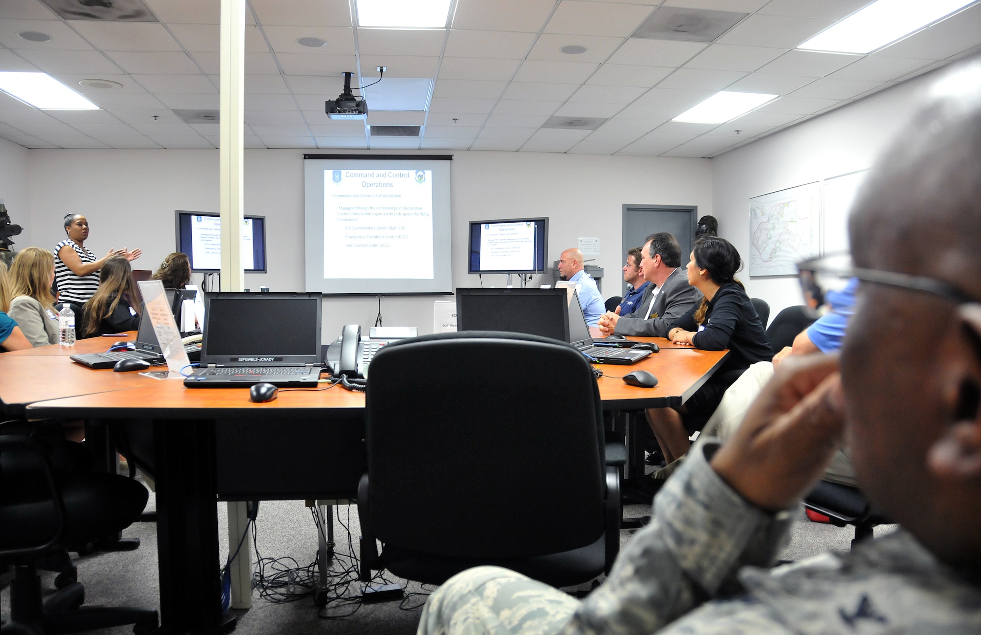 Josephine Atkins, 94th Emergency Management chief, met with the council in the Emergency Operations Center and explained how the EOC integrates with agencies on base and the surrounding community during an emergency, June 6. Members of the 94th Airlift Wing hosted the Hercules Council, a grassroots community relations program named in honor of its trademark transport aircraft fleet. (U.S. Air Force photo/Senior Airman Elizabeth Van Patten)