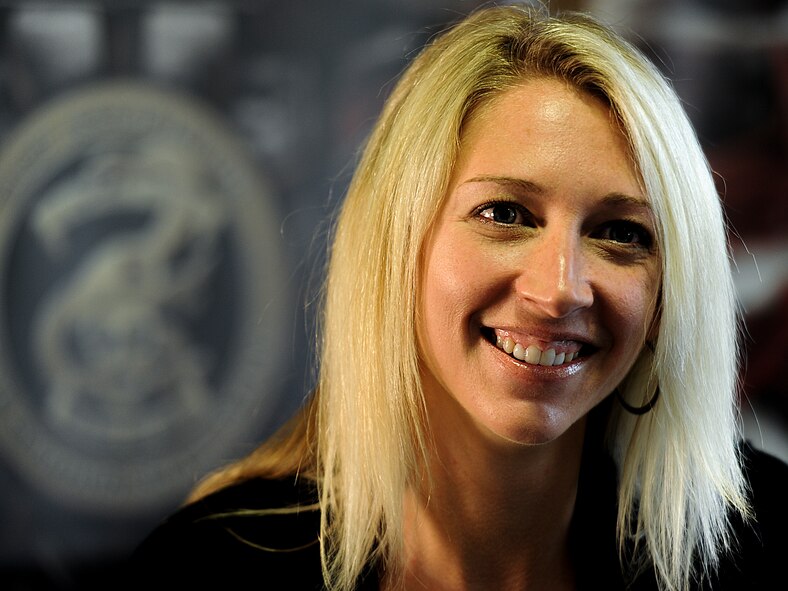 Heather Gray, widow of Maj. David Gray, smiles as she talks about the memories she had with Gray during an interview at King Auditorium on Hurlburt Field, Fla., June 6, 2013. Heather and Tactical Air Control Party members gathered for a memorial service at the TACP school, held to honor Gray, who passed away due to combat-related injuries August 8, 2012. (U.S. Air Force photo/Airman 1st Class Christopher Callaway)