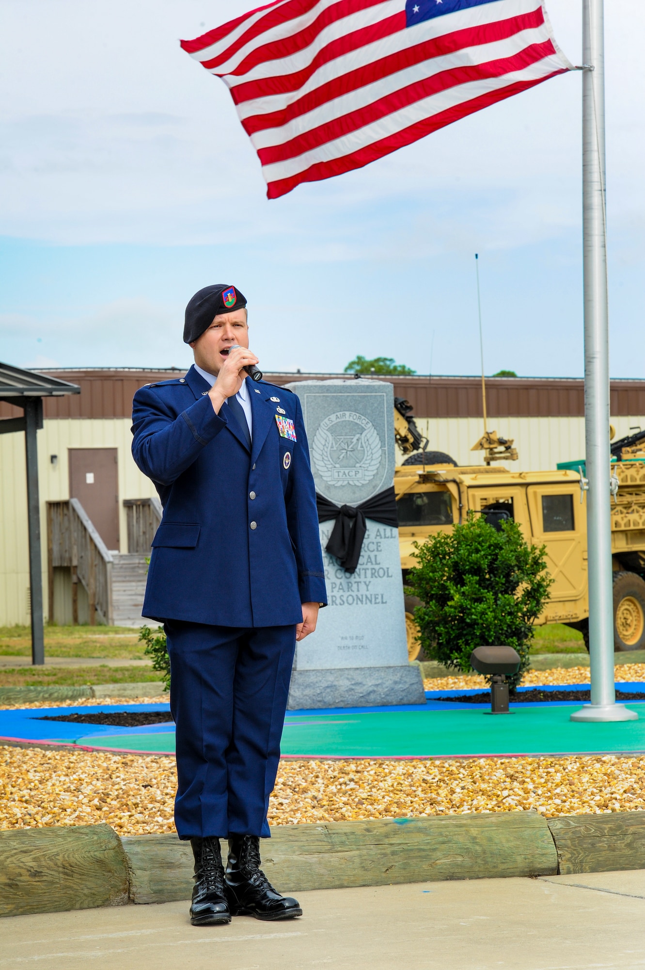 Second Lt. Brandon Craig, A-flight commander, Detachment 3, 342nd Training Squadron, sings the National Anthem during a memorial ceremony held at the Tactical Air Control Party School House on Hurlburt Field, Fla., June 6, 2013. TACP members remembered a fallen comrade during the annual TACP Association memorial and reunion.  (U.S. Air Force photo/Airman 1st Class Christopher Callaway)