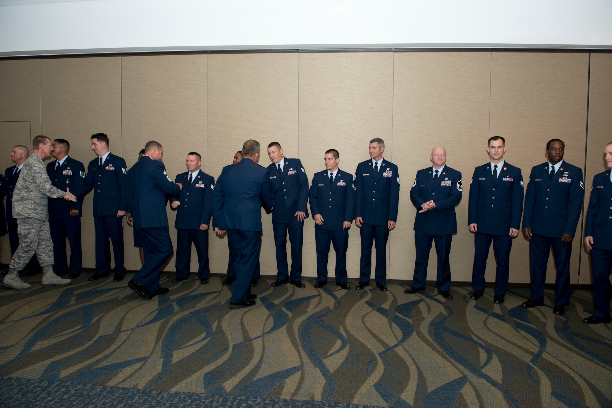 One hundred thirty-seven Community College of the Air Force associate degrees were awarded during a commencement ceremony held at Horizons, June 11. (U.S. Air Force photo by Lisa Norman) 