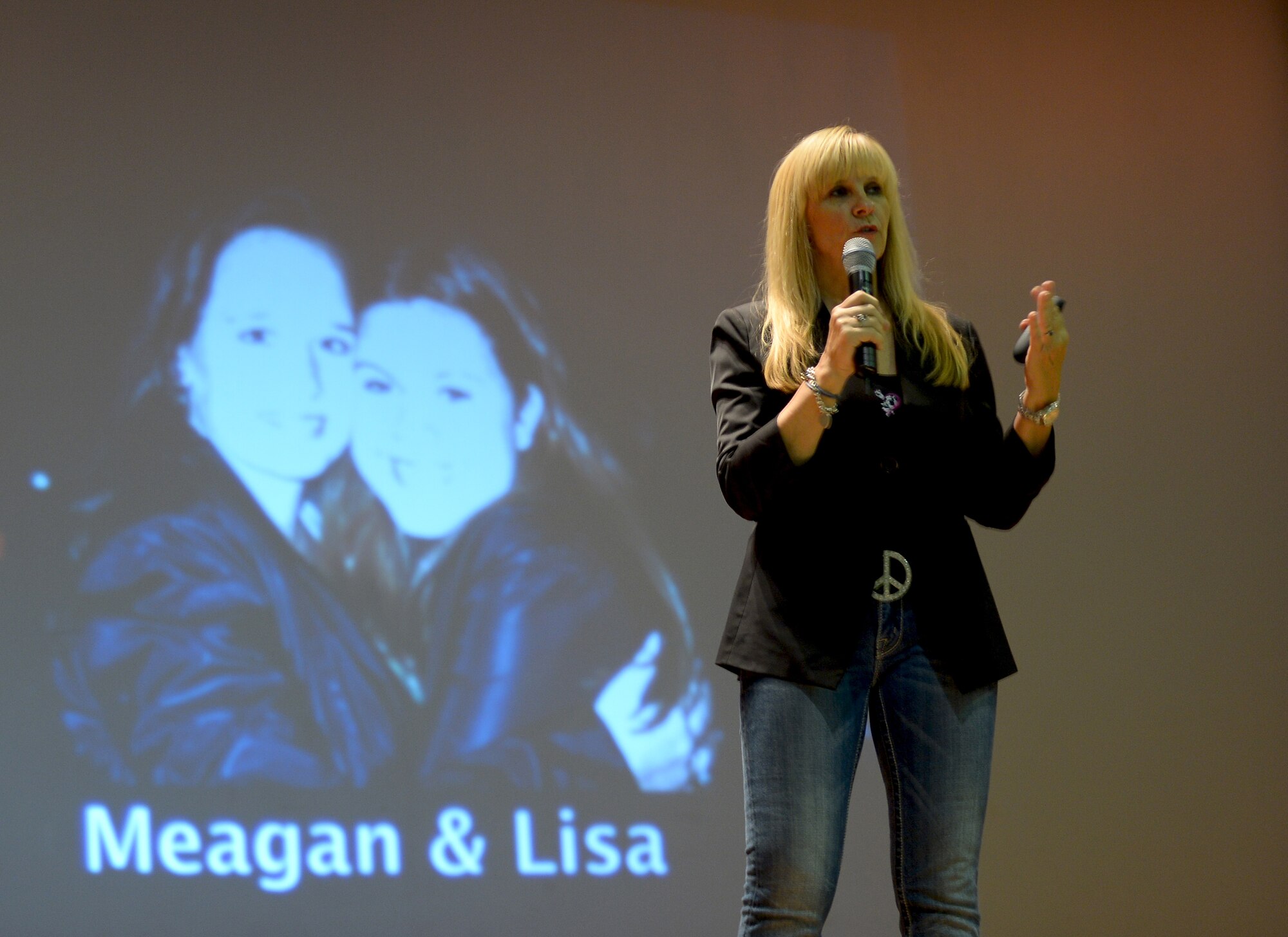 Renee Napier, mother of driving under the influence victim Meagen Napier, briefs a crowd of more than 500 on the devastating consequences DUI can have, May 31, 2013 at MacDill Air Force Base, Fla. Almost 11 years ago to the day, Meagan Napier and her friend Lisa Jo Dickson were killed by drunken driver Eric Smallridge as they headed home. Renee Napier made it her life's mission to prevent more unnecessary deaths like that of Meagan's. (U.S. Air Force Photo by Staff Sgt. Brandon Shapiro/Released)