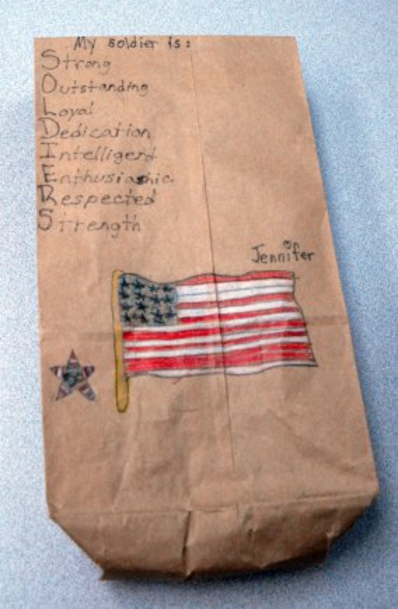 A decorate bag, once filled with candy, made by a grade school student more than a decade ago. 2nd Lt. Jennifer Szatkowski, a second year medical student with the Uniformed Services University of the Health Sciences, saw the bag she made for service members, on a bulletin board where she was having her teeth cleaned. (Courtesy photo)