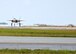 Two new Air Force variants of the F-35 Lightning II taxi in to Eglin Air Force Base, Fla., for the first time June 5, 2013. The 33rd Fighter Wing received the F-35A Lightning II jets bringing the total to 12 Air Force joint strike fighters.  Including the Marine Corps variant of the F-35 based here, the training fleet grew to 25 F-35A and F-35B joint strike fighters. The Navy F-35C variant is slated to arrive in the coming weeks. (U.S. Air Force photo/Staff Sgt. Nicholas Egebrecht)