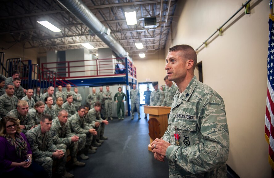 U.S. Air Force Lt. Col. James Meier, 824th Base Defense Squadron commander, gives a speech after being awarded a Bronze Star Medal at Moody Air Force Base, Ga., June 7, 2013. After receiving his Bronze Star Medal, Meier awarded bronze stars to three other Airmen from the 824th BDS. (U.S. Air Force photo by Senior Airman Jarrod Grammel/Released)
