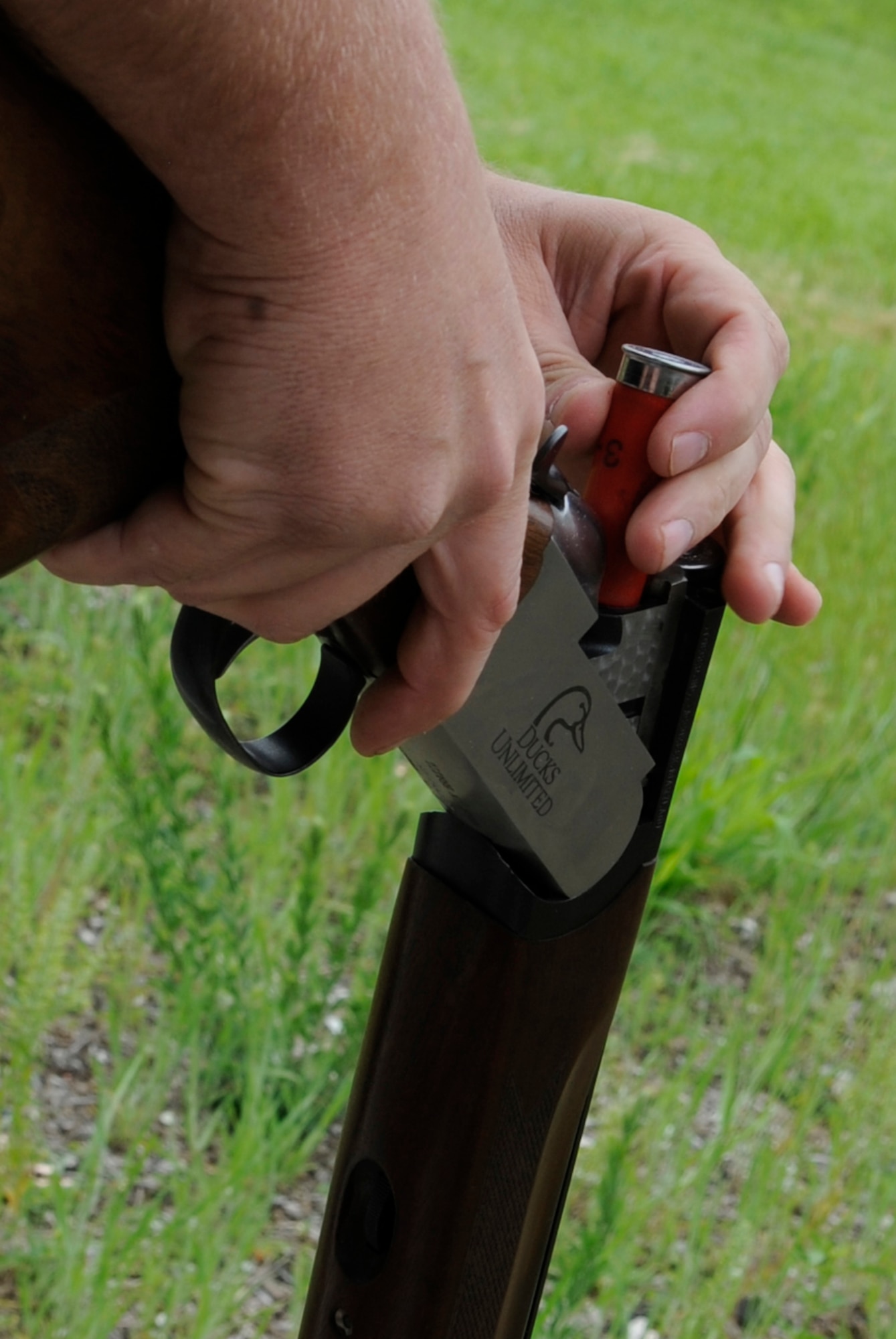 Senior Master Sgt. Frederick Transburg, Air Force Reserve recruiter, loads his shotgun at the Whiteman Air Force Base Skeet and Trap Range, May 22, 2013.  The range is designed exclusively for shotgun use, and no other firearms are allowed. (U.S. Air Force photo by Staff Sgt. Alexandra M. Boutte/Released)