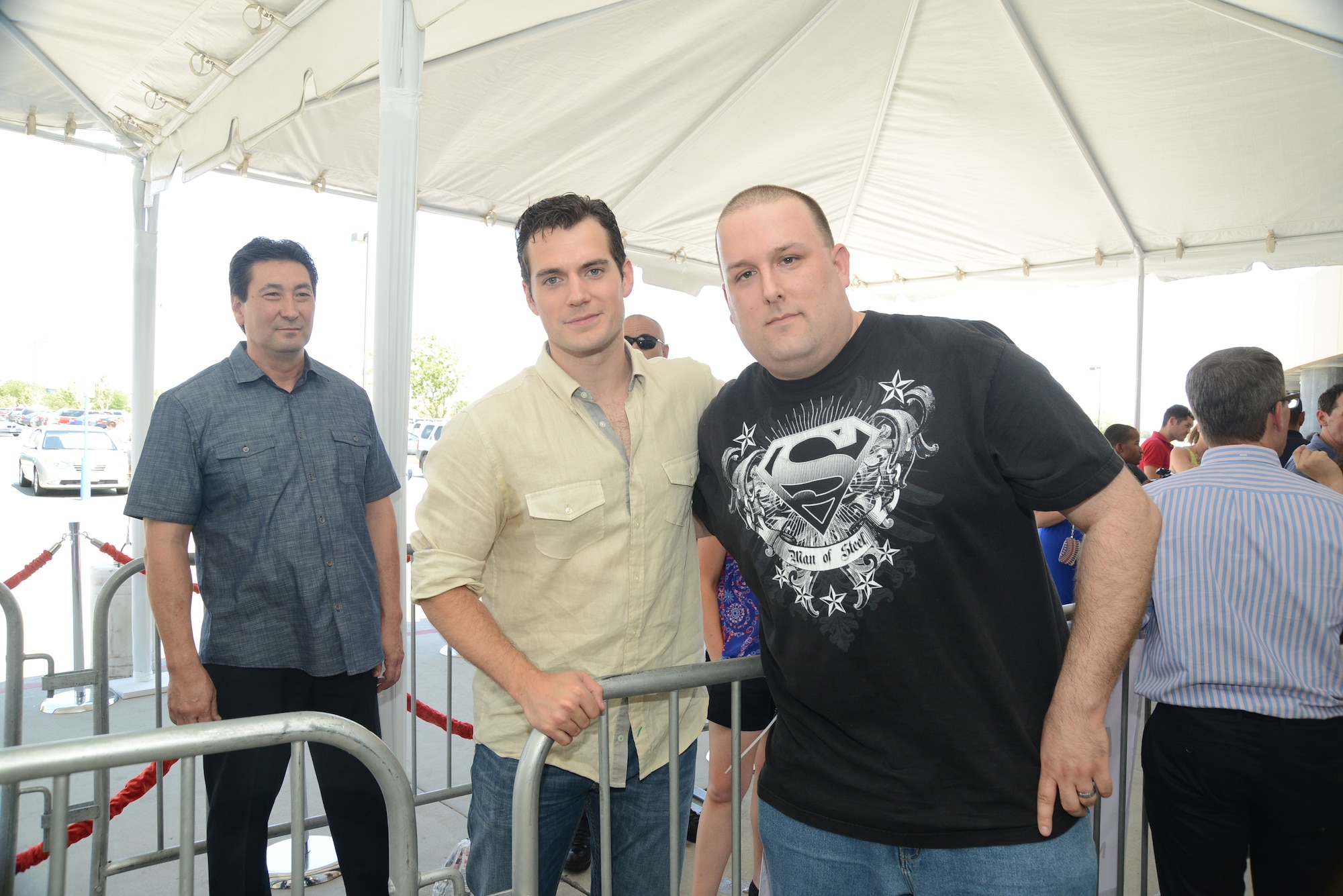 John Nichols, 412th Civil Engineering Division, poses for a photo with the "Man of Steel."