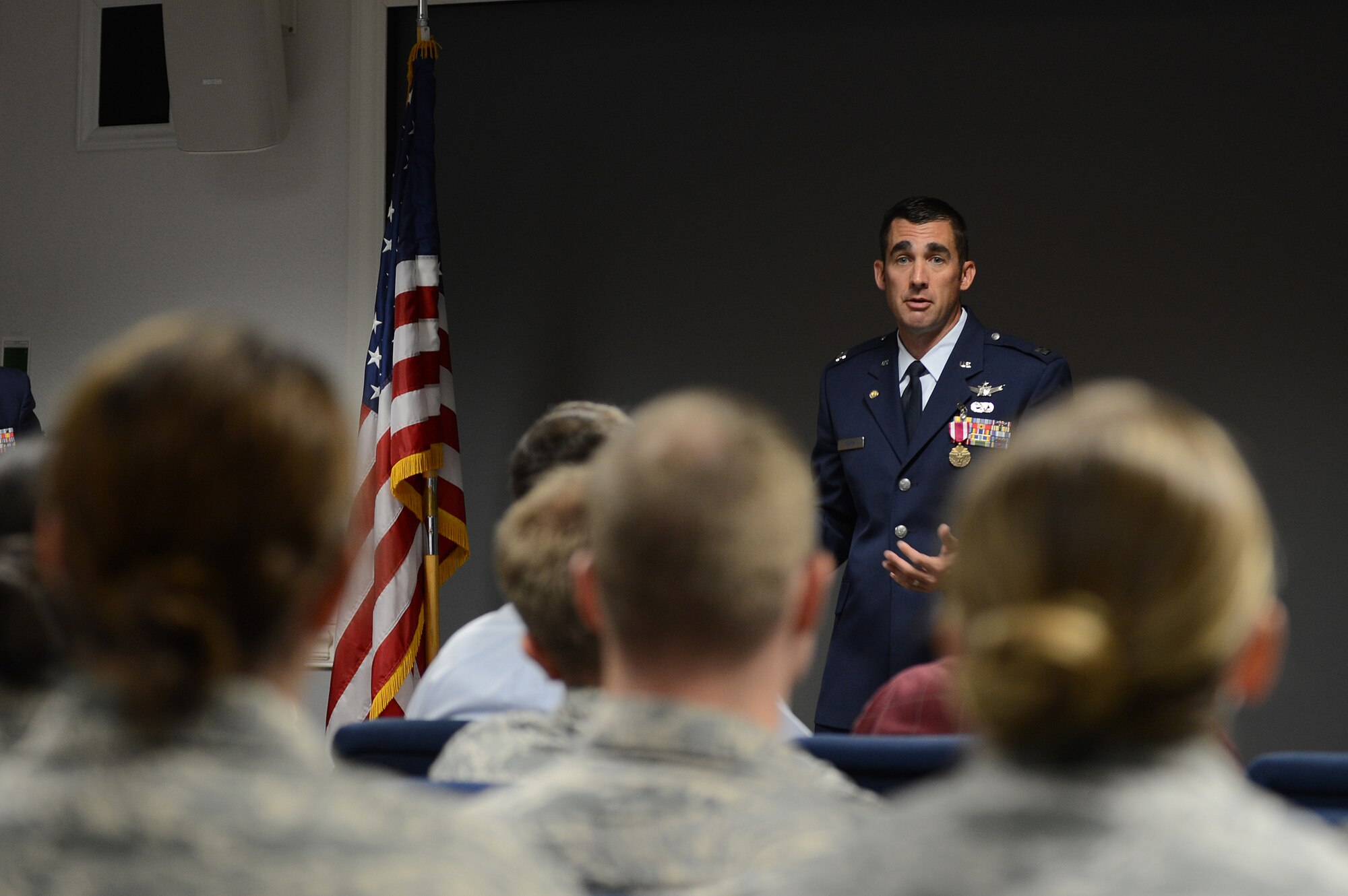 Capt. Christopher Snapp, Air Forces Central 609th Air Operations Center Detachment 1 operations flight commander, shares words of encouragement and wisdom he learned throughout his career with Airmen in attendance at his retirement ceremony, Shaw Air Force Base, S.C., June 7, 2013. Snapp served from 1992 to 2013, and retired at the grade of captain. (U.S. Air Force photo by Airman 1st Class Daniel Blackwell/Released)