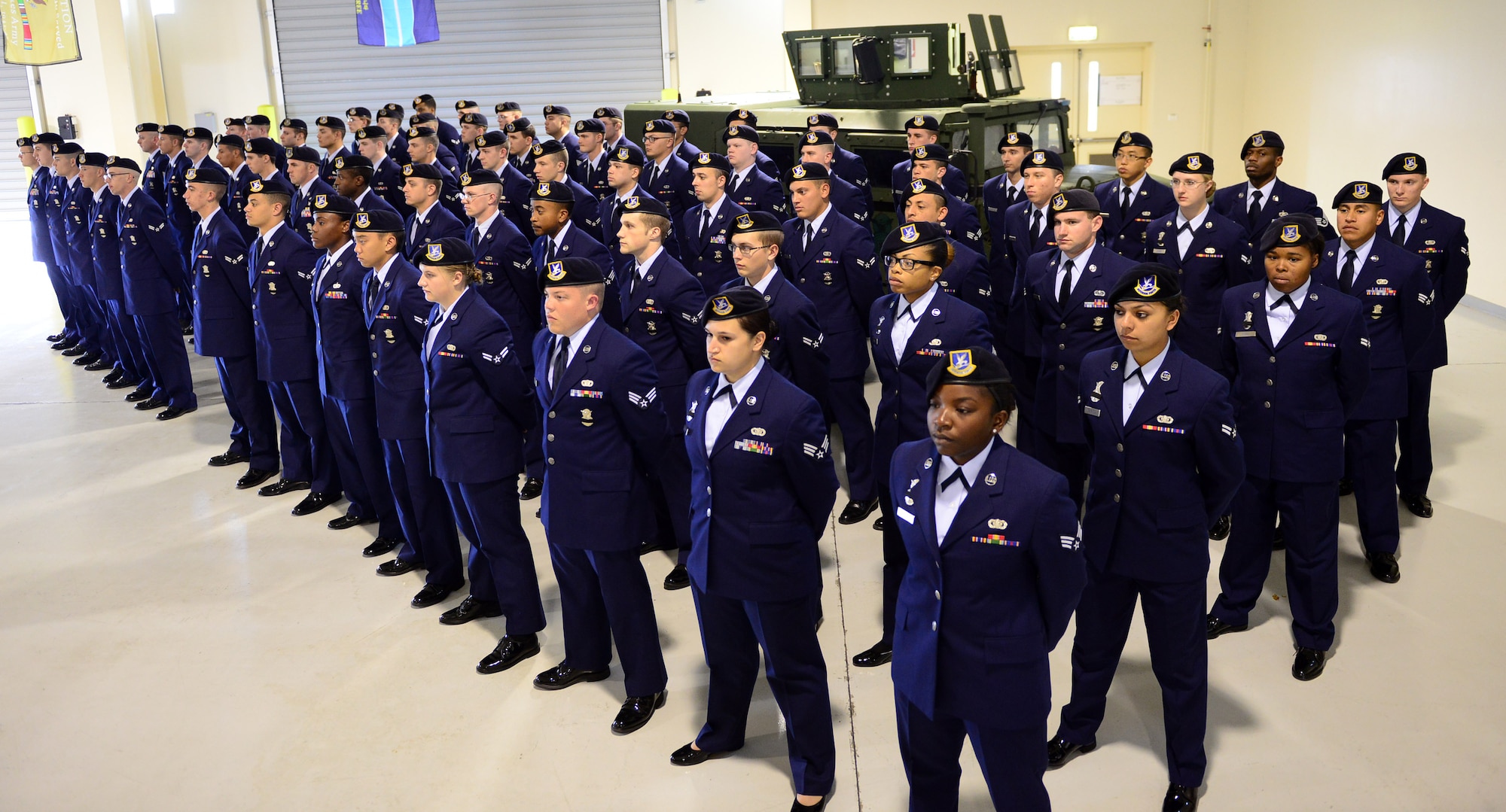 Members of the 31st Security Forces Squadron stand in formation during a memorial ceremony for Airman 1st Class Dennis A. Felton II held June 11, 2013 at Aviano Air Base, Italy. Felton was killed in a motor vehicle crash which occurred near the base June 2. (U.S. Air Force photo/Airman 1st Class Matthew Lotz)