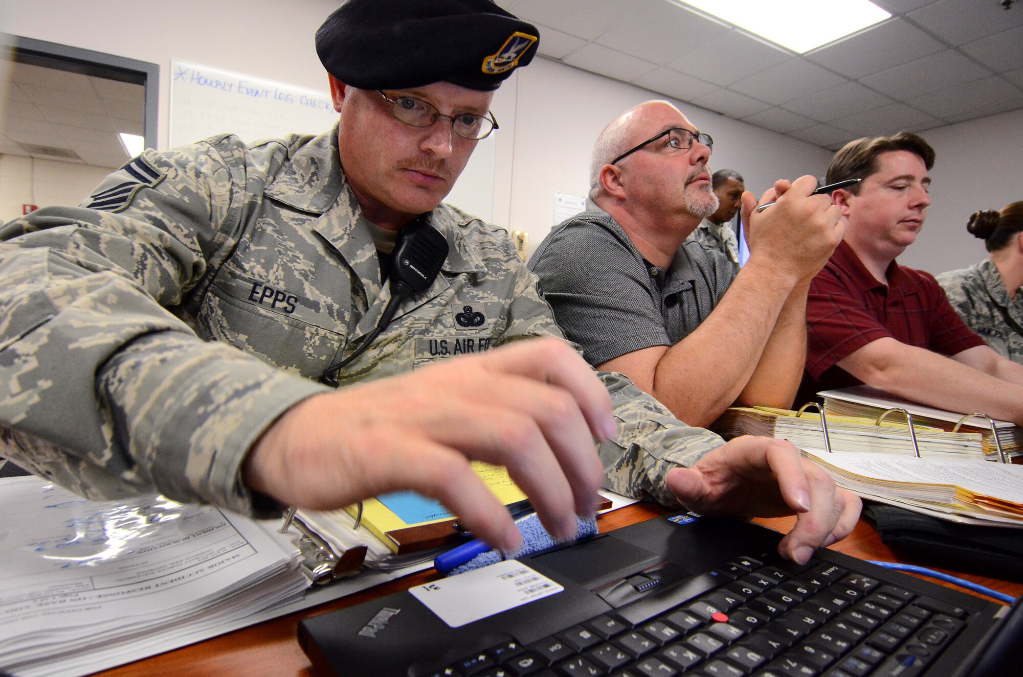 Senior Master Sgt. Rocky Epps, 94th Security Forces Squadron, inputs information into an Emergency Operations Center computer during a Major Accident Response Exercise at Dobbins Air Reserve Base, Ga., May 10. The exercise scenario tested the abilities of first responders and key wing leaders and managers to effectively deal with an evolving emergency situation during their 2013 Air Force Reserve Command, Consolidated Unit Inspection. (U.S. Air Force photo/Brad Fallin)