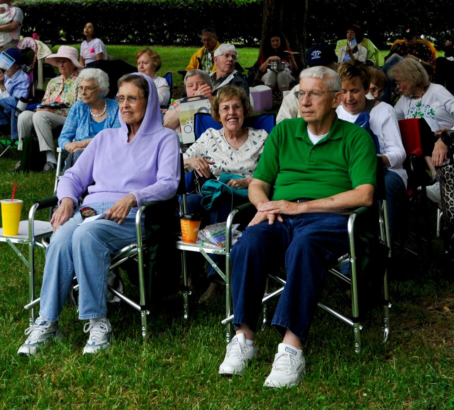 Marian and Frank Supplee, residents of Yorktown, Va., enjoy the music of the U.S. Army Training and Doctrine Command Band during the “Music Under the Stars” kickoff event, June 6, 2013, at Fort Eustis, Va. The music series which is now in its 81st year is scheduled to hold concerts every Thursday evening at 7 p.m. through the month of August. (U.S. Air Force photo by Staff Sgt. Wesley Farnsworth / Released)