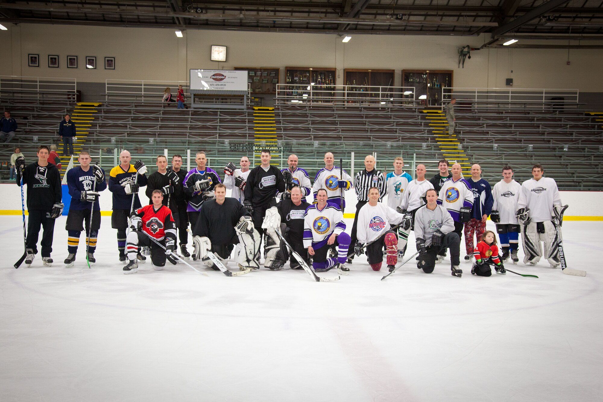 Members of the 934th Airlift Wing play against each other in a friendly game of hockey at the Wakota Civic Arena after the June Unit Training Assembly weekend.  (U.S. Air Force photo/Shannon McKay)