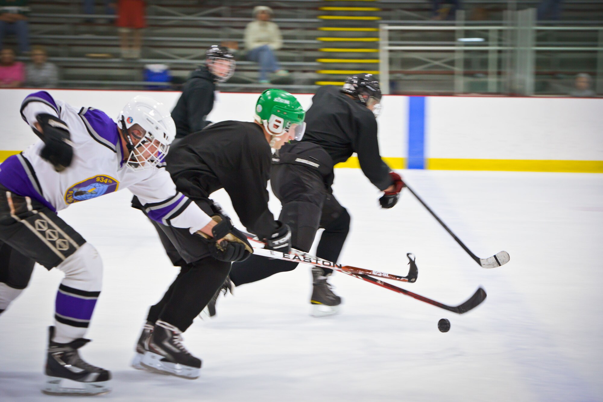 Members of the 934th Airlift Wing play against each other in a friendly game of hockey at the Wakota Civic Arena after the June Unit Training Assembly weekend.  (U.S. Air Force photo/Shannon McKay)