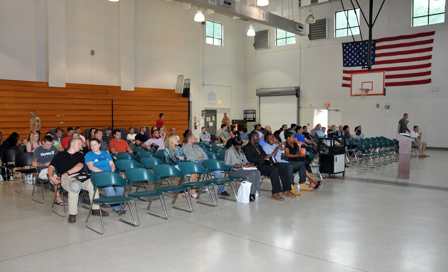 Marines in the Individual Ready Reserve program await the beginning of a muster on June 9 at the Navy Operations Support Center here. Over 180 Marines in the Individual Ready Reserve program were selected to attend the 2013 Marine IRR Muster where they were briefed on information regarding veterans’ benefits, education options, reenlistment options, job placement opportunities and information regarding issues in the military such as suicide prevention. (U.S. Air Force photo/Senior Airman Elizabeth Van Patten)